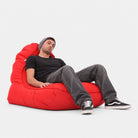 Man reclining in the supportive Street Cred Red AirMesh lounge